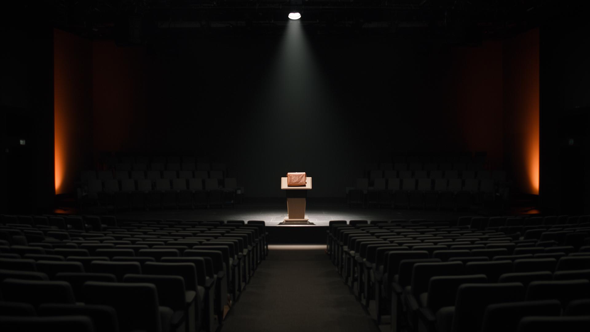 The Town Hall After the Layoffs. AI Cannot Walk Through That Door.